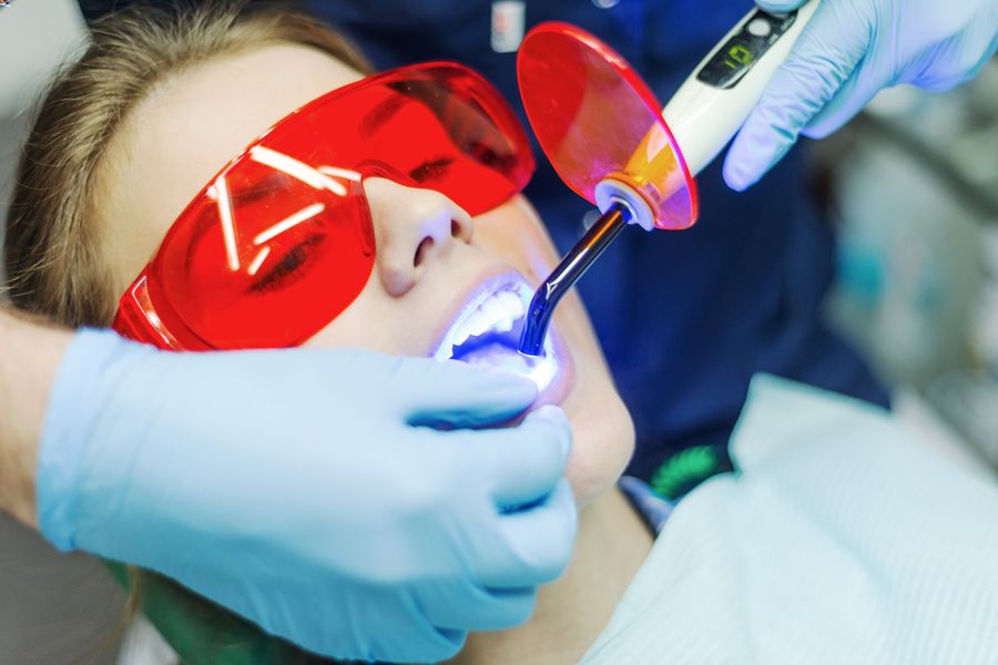 Patient in the middle of laser dentistry